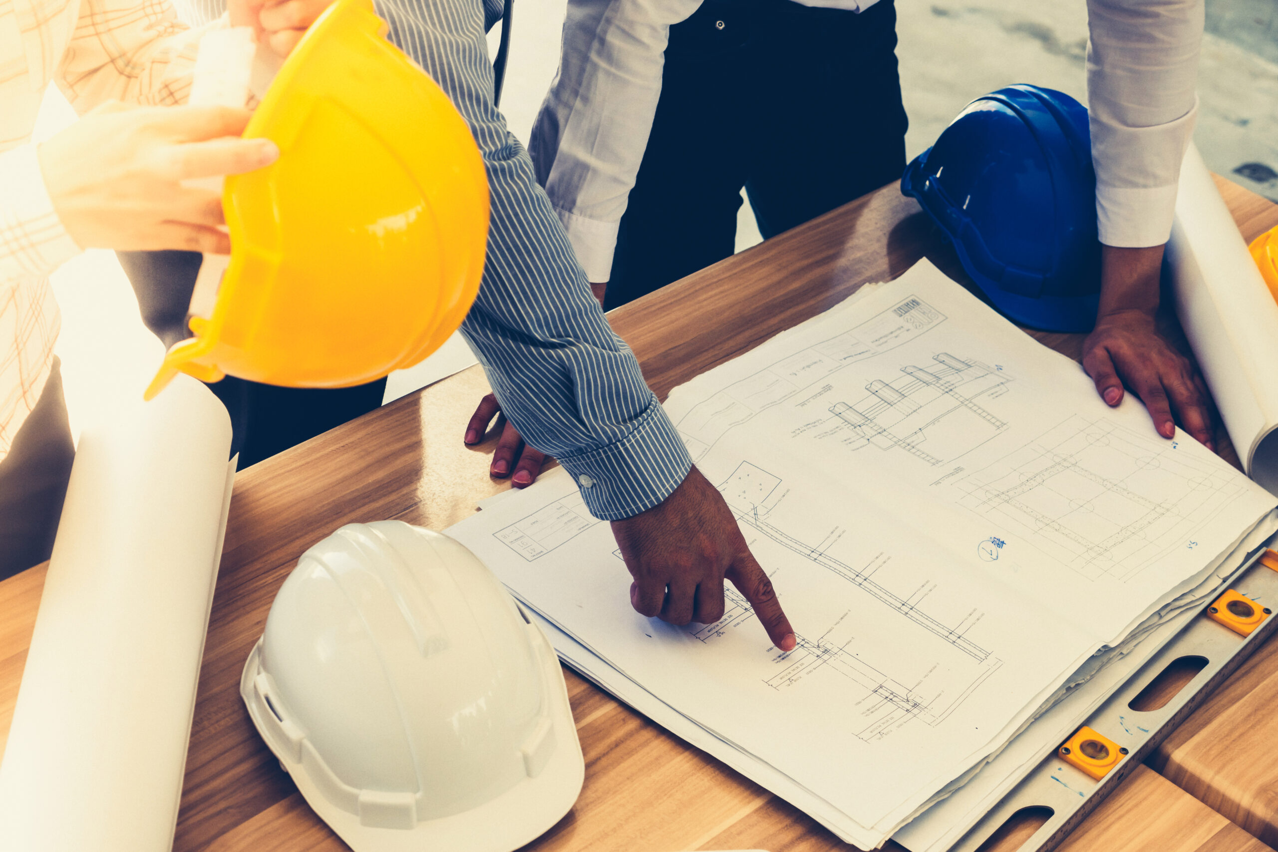 Engineer reviewing revised drawings